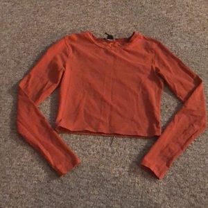 Orange long sleeve crop top